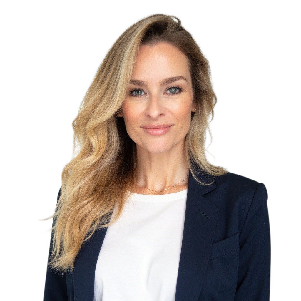 Smiling blonde professional woman in navy blazer